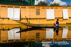 House Boats reflecting on the waters of Lake Dal, Srinagar, Kashmir, India