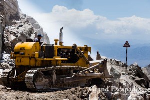 Road construction requires to blast some rocks from the mountain slope right at the pass - Here at Khardung La, we stayed 3 hours blocked at 5.602 meters - Ladakh, India