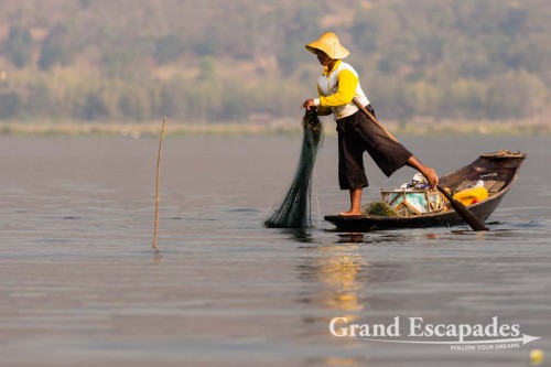 Fishermen on Inle Lake, Myanmar - Them rowing their boats with one leg contributed to making the lake a legend. This technique allows them to throw / pull their nets with both hands.