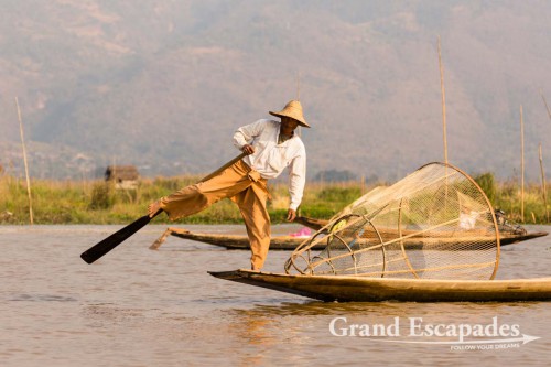 Fishermen on Inle Lake, Myanmar - Them rowing their boats with one leg contributed to making the lake a legend. This technique allows them to throw / pull their nets with both hands.