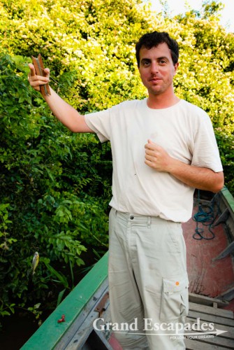 Look hard! Then you can see the "huge" Piranha dangling from Gilles´ fishing line. This was the only catch of the day ...