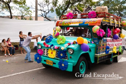 On Sunday, the last day of the festival, decorated Chivas took the streets, full of cheerful folks. Large spray cans are used by people inside and outside the Chivas to cover each other with foam.