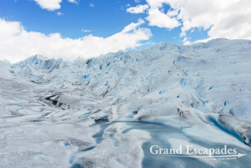 Two guides led the way through the magic world of ice and soon we could see nothing but ice and the sky. Every few minutes the view changed and seemed even more spectacular. We all seemed to be completely absorbed by this unique experience - Glacier Perito Moreno, El Calafate, South Patagonia, South America
