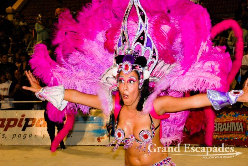 The dancers were a swaying sea of colours of elaborately designed costumes, headdresses made of feathers and beads, more beadwork for ankles, necks, belly and wrists. The costumes can be made of lots of material or of very, very little, Carneval of Gualeyguachu, Argentina