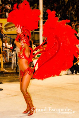 The dancers were a swaying sea of colours of elaborately designed costumes, headdresses made of feathers and beads, more beadwork for ankles, necks, belly and wrists. The costumes can be made of lots of material or of very, very little, Carneval of Gualeyguachu, Argentina