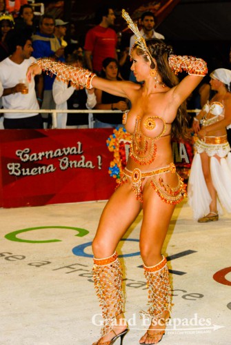 The dancers were a swaying sea of colours of elaborately designed costumes, headdresses made of feathers and beads, more beadwork for ankles, necks, belly and wrists. The costumes can be made of lots of material or of very, very little, Carneval of Gualeyguachu, Argentina
