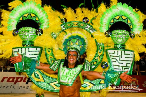 The dancers were a swaying sea of colours of elaborately designed costumes, headdresses made of feathers and beads, more beadwork for ankles, necks, belly and wrists. The costumes can be made of lots of material or of very, very little, Carneval of Gualeyguachu, Argentina