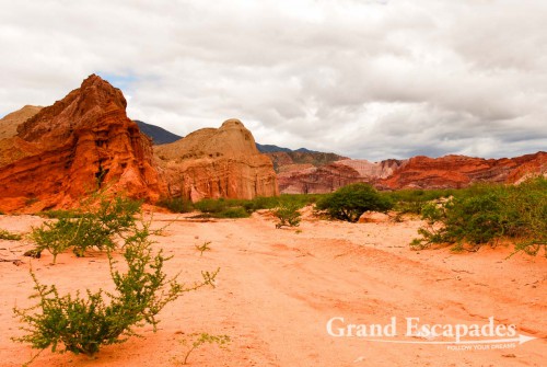 La Quebrada de Cafayate - A magic display of colours, dark red or pinkish hills and whitish cliffs with brown tops are often twisted into bizarre formations.