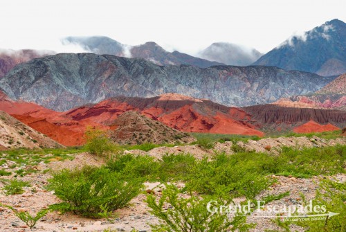 La Quebrada de Cafayate - A magic display of colours, dark red or pinkish hills and whitish cliffs with brown tops are often twisted into bizarre formations.
