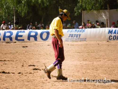 Crina Limpia - It is a gaucho trying to stay on a horse without a saddle, only holding on to a rope tied around the horse?s neck pushing his long spurs into the horse?s belly. The gaucho has to stay on the bucking horse for 13 seconds, otherwise he is disqualified - Maimara, near San Salvador de Jujuy, Northwest Argentina