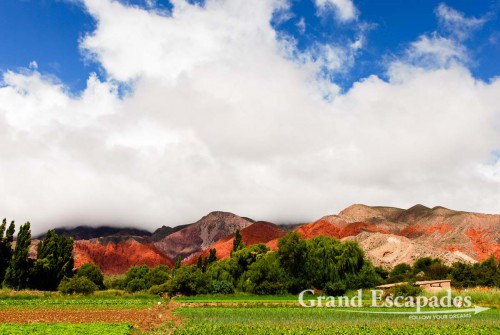 La Quebrada de Humahuaca - A magic display of colours, dark red or pinkish hills and whitish cliffs with brown tops are often twisted into bizarre formations
