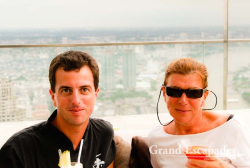 Enjoying a view of Bangkok from high ip, with a cocktail, of course...