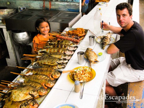 Food stall at Mercado Comunal in Manaus, we enjoyed fish fresh from the Amazon, for 5 Reals (less than 2 Euros) each !!!