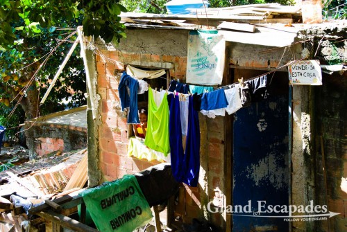 Rocinha, home to 180.000 people, is the biggest favela in Rio de Janeiro, Brazil - Also in Rocinha, you can sell & buy a house ... The owner of this one wants 9.000 Reals (4.500 USD), even thoug our guide told us a realistic price would be 5.000 Reals. Interested ?