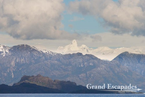 Cruise from Puerto Montt to Puerto Natales, Patagonia, Chile - In the evening we passed another glacier in the distance, as a consequence large junks of ice were drifting along the boat, giving us a really chilly artic feeling