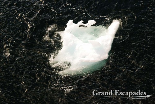 Cruise from Puerto Montt to Puerto Natales, Patagonia, Chile - In the evening we passed another glacier in the distance, as a consequence large junks of ice were drifting along the boat, giving us a really chilly artic feeling
