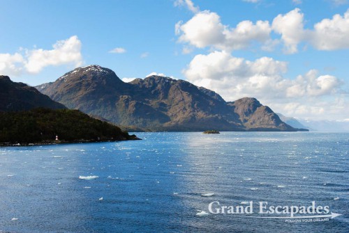 Cruise from Puerto Montt to Puerto Natales, Patagonia, Chile - In the evening we passed another glacier in the distance, as a consequence large junks of ice were drifting along the boat, giving us a really chilly artic feeling