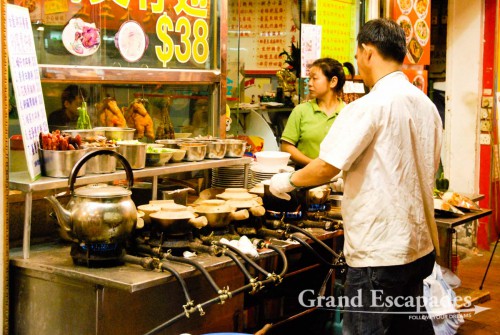 Hong Kong is also truly Asian with small restaurants where neither the menu nor the staff is able to communicate with the foreigner about what there is to eat, buzzing markets with people selling just about everything, touts trying to lure into buying tailor made shirts and suits, fake Rolex and pirate DVDs. We just love it!