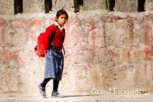 Younf girl coming back from school, Cabanaconde, Peru
