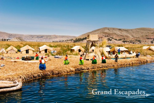 Approaching one of the show-case islands for tourists! - Uros Floating Islands, Lake Titicaca, Peru, South America