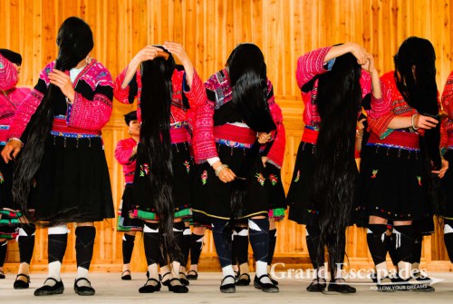 Yan women, famous for their long, pitch-black hair that they whirl around their head like a turban, Ping'An, China