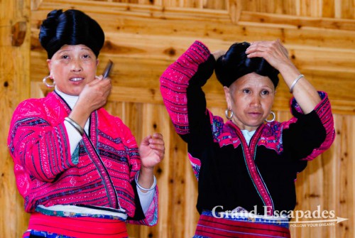 Yan women, famous for their long, pitch-black hair that they whirl around their head like a turban, Ping'An, China