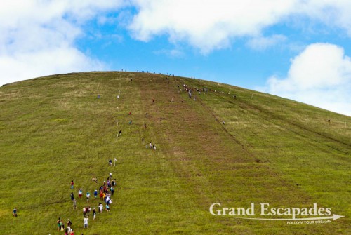 Tapati Rapa Nui, Haka Pei (Young men sliding down the steep slopes of volcano Maunga Pui on log cut from a banana tree about two meter long), Rapa Nui or Easter Island, Pacific