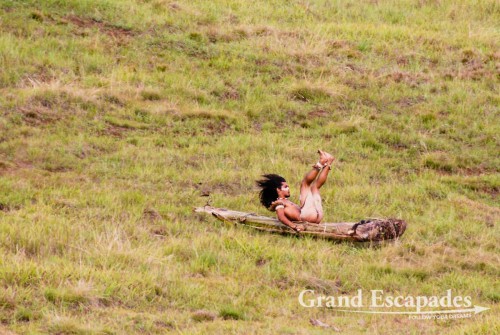 Tapati Rapa Nui, Haka Pei (Young men sliding down the steep slopes of volcano Maunga Pui on log cut from a banana tree about two meter long), Rapa Nui or Easter Island, Pacific