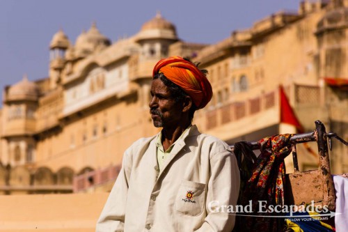 Elephants carrying tourists up to Amber Fort in the morning, near Jaipur, the Pink City, Rajasthan, India