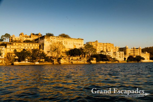 View of the City Palace, during a Boat Ride at Sunset, Lake Pichola, Udaipur, Rajasthan, India