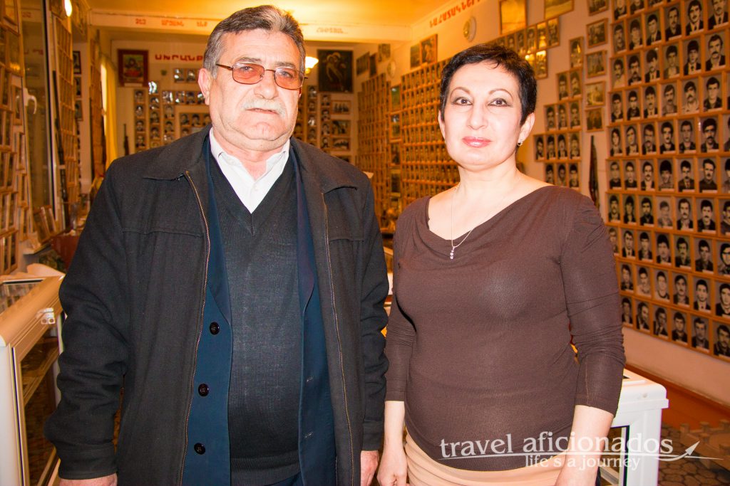 Stepanakert- Museum of Fallen Soldiers. The man, whose brother was killed in the war, is looking after the museum. The lady arrived just for me to translate the goals of the museum.
