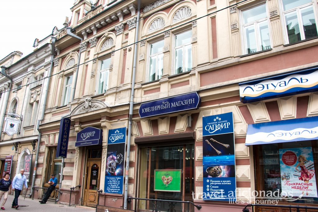 Irkutsk's beautiful houses are dominated by advertisements
