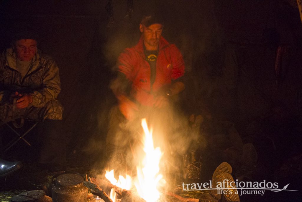 sitting around the campfire with the herders